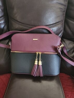 Two-Tone Burgundy and Black Crossbody Bag with Tassel Detail